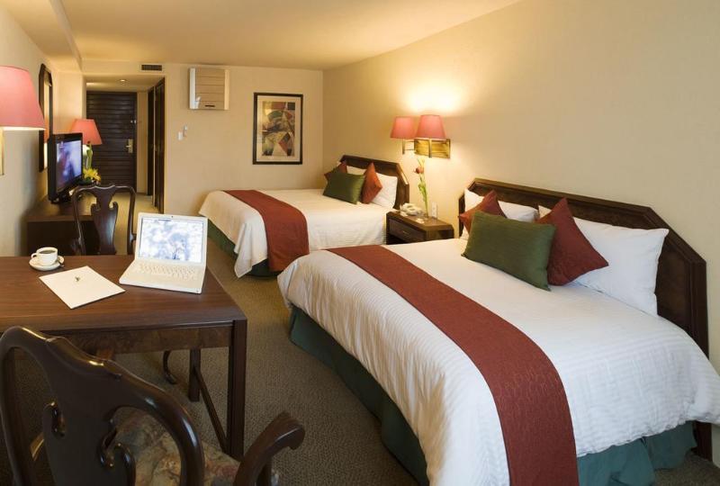 La Joya Pachuca Hotel Luaran gambar A typical hotel room